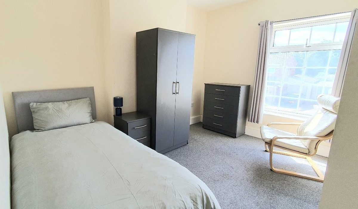 Light, warm rooms with space to sit and read — somewhere that feels settled, not temporary.